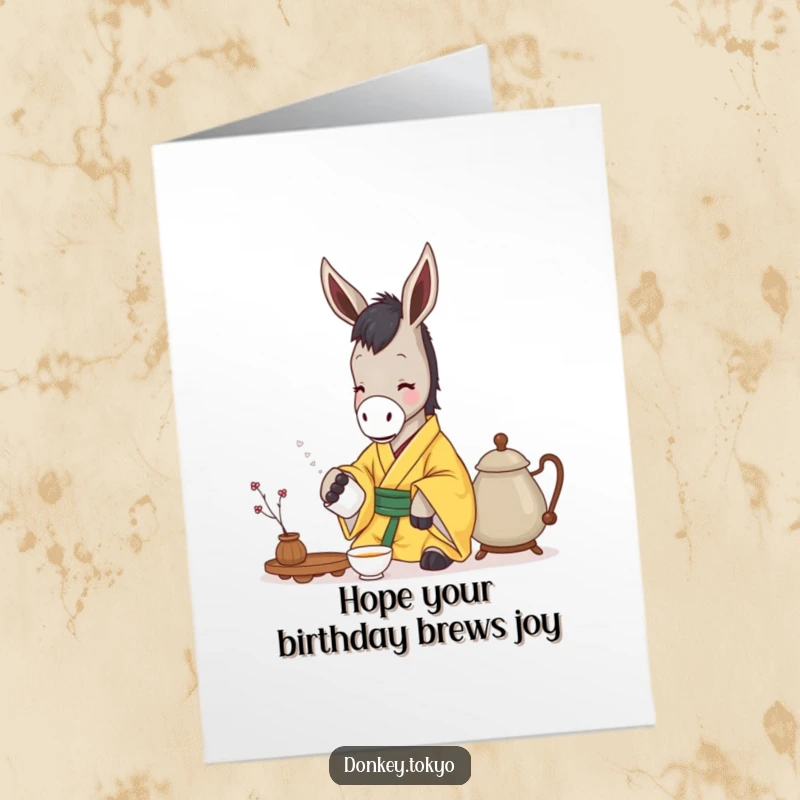 Funny Free Printable Birthday Card with a serene donkey in a yellow kimono gently pouring tea from a pot.